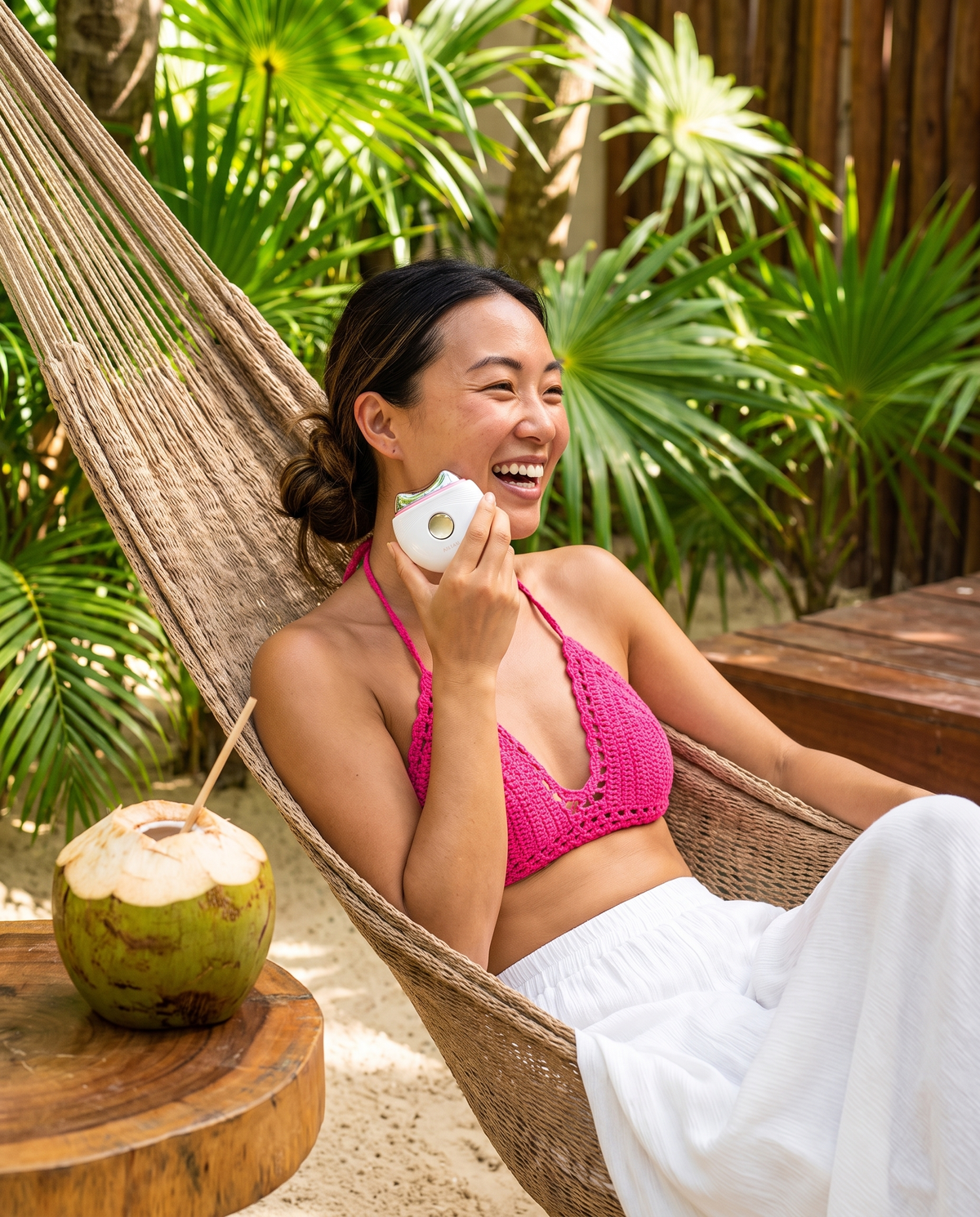 Heated gua sha in a Tulum hammock